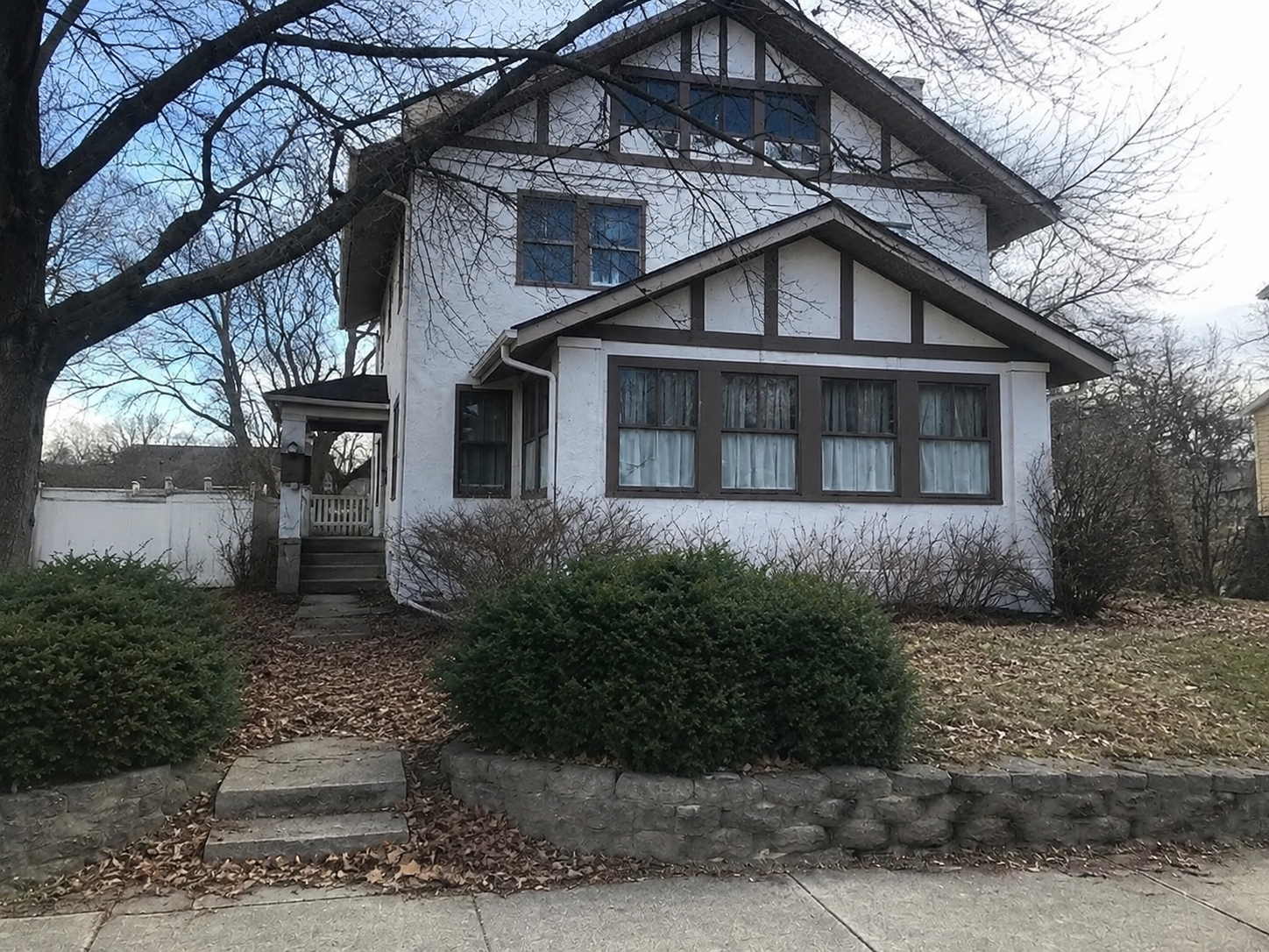 Historic home renovation before exterior at Maple Street property in Brookville Ohio.