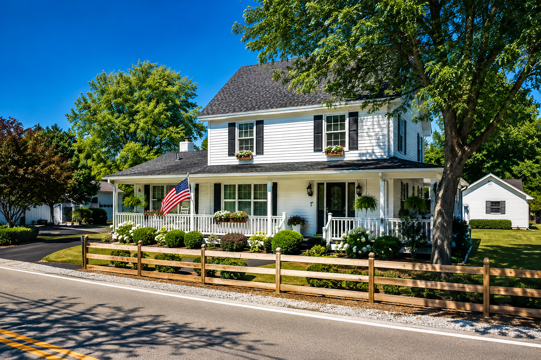White siding installed by Thrush & Son® on a two-story home in Troy, Ohio.