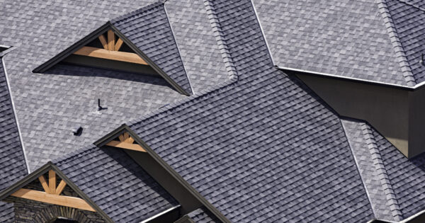 Aerial few of black shingled roof | Roofing terminology and FAQs