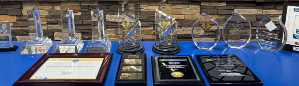 Collection of industry awards and certifications earned by Thrush & Son® including roofing excellence honors, contractor recognition, and professional achievement trophies.