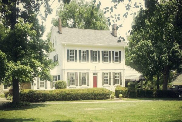 Historic Centerville Home before restoration showcasing classic colonial architecture and original exterior details