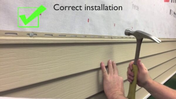 vinyl siding installation problems caused by oil canning from improper fastening